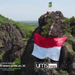 Read more about the article Milad ke-108: Kader Persyarikatan Bentangkan Merah Putih dan Bendera Muhammadiyah di Tebing Sepikul Sukoharjo